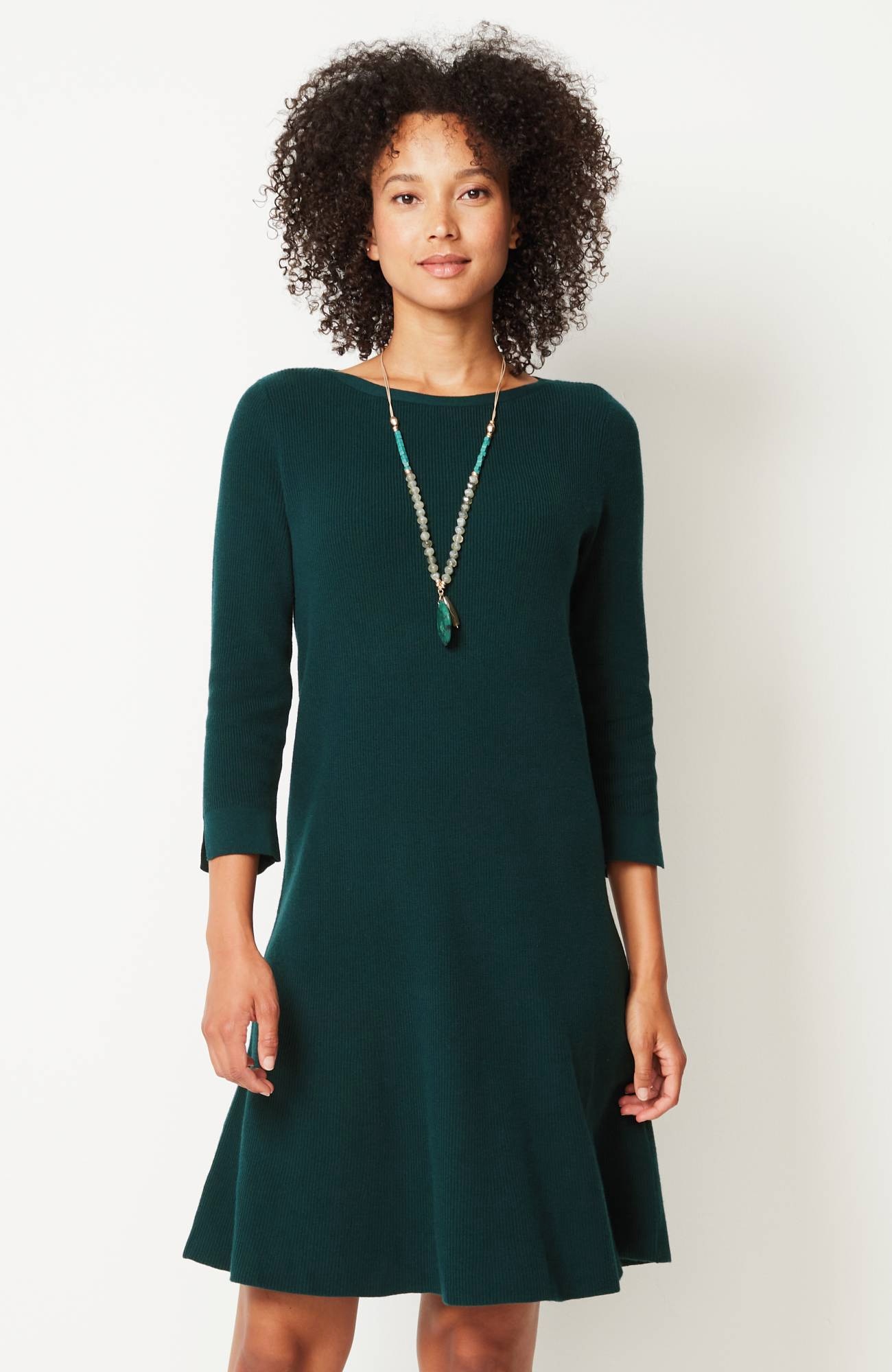 flounced-hem sweater dress