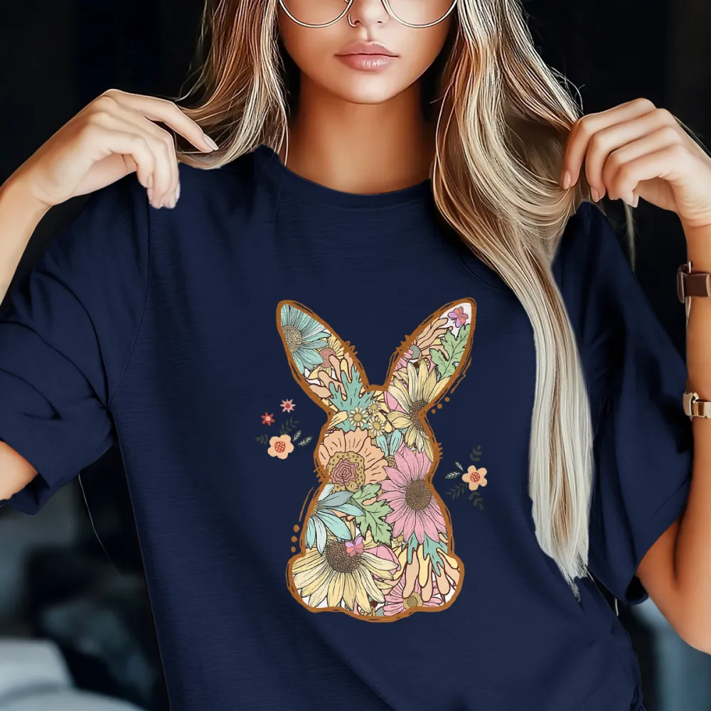 An Illustration Based On The Outline Of A Rabbit, With Floral Patterns Of Various Colors Filled In And Some Small Flowers And Leaves Dotted Around It, A Casual T-Shirt.
