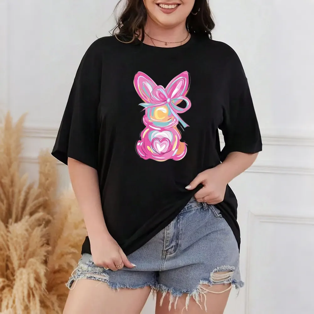 A Hand-Painted Rabbit Pattern With Pink As The Main Color, Matched With Blue, Yellow, Orange And Other Colors. The Rabbit Has Bow And Heart Elements On Its Body. It Is A Casual T-Shirt.