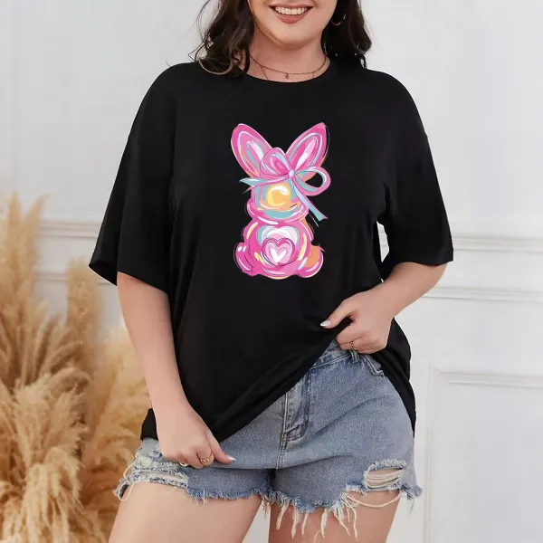 A Hand-Painted Rabbit Pattern With Pink As The Main Color, Matched With Blue, Yellow, Orange And Other Colors. The Rabbit Has Bow And Heart Elements On Its Body. It Is A Casual T-Shirt.