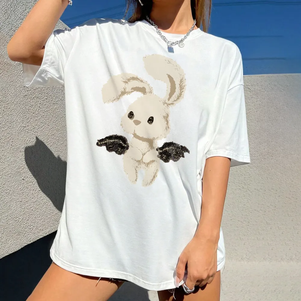 A Cartoon Rabbit With Black Wing Patterns On Both Sides, Cute And Fresh Style, Loose And Casual T-Shirt.