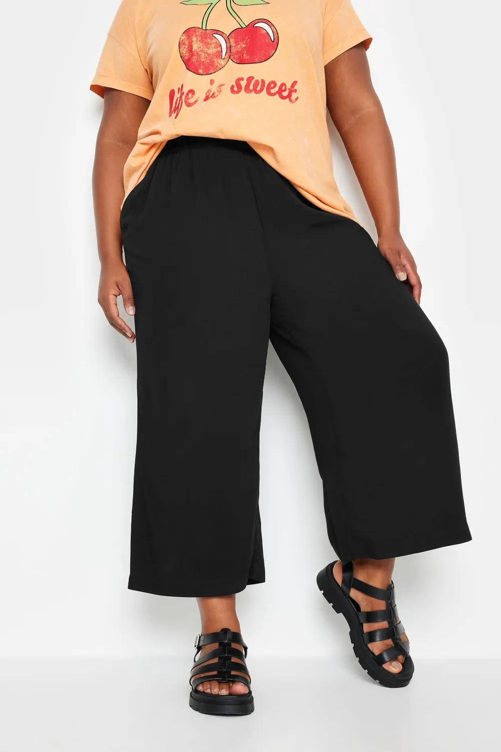 YOURS Curve Green Leaf Print Cropped Trousers