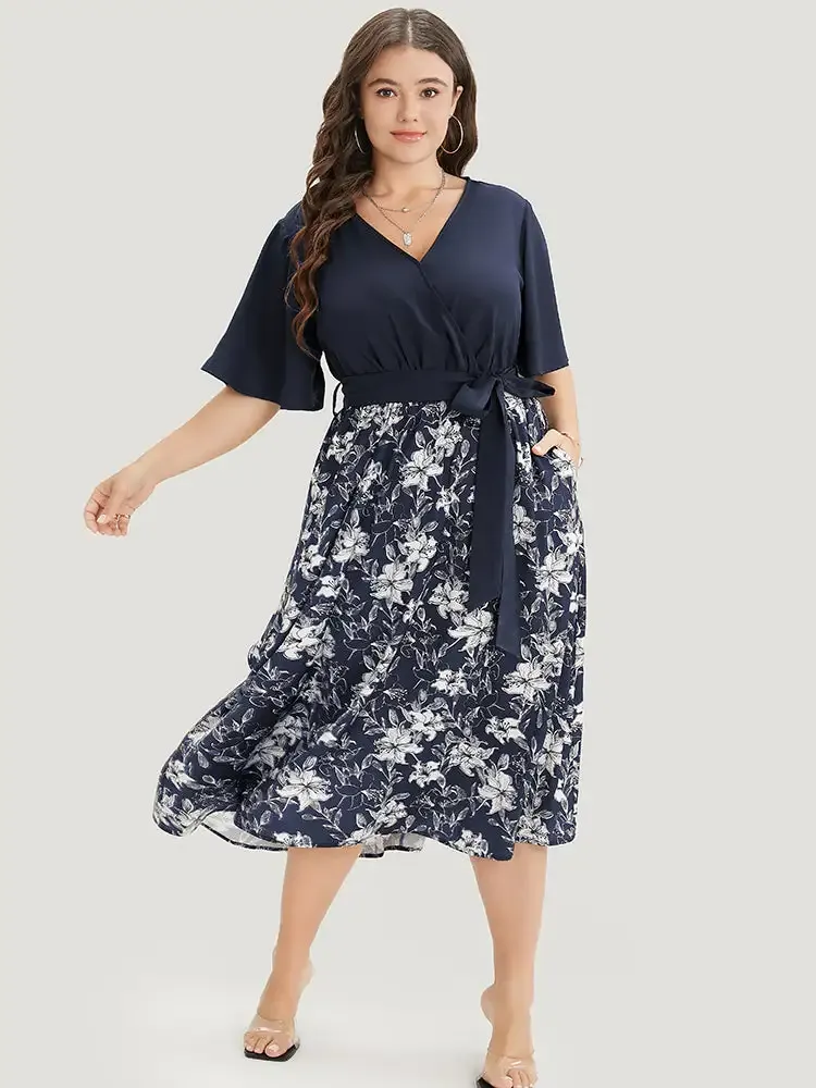 Floral Patchwork Pocket Belt Surplice Neck Ruffle Hem Dress