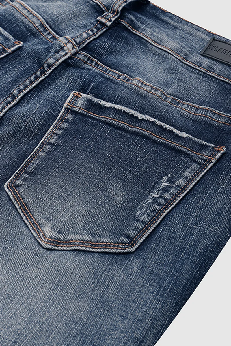 Ripped Slant Pocket Flare Jeans