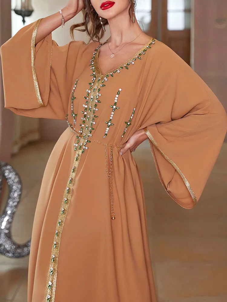 Hand sewn diamond flared sleeve dress gown