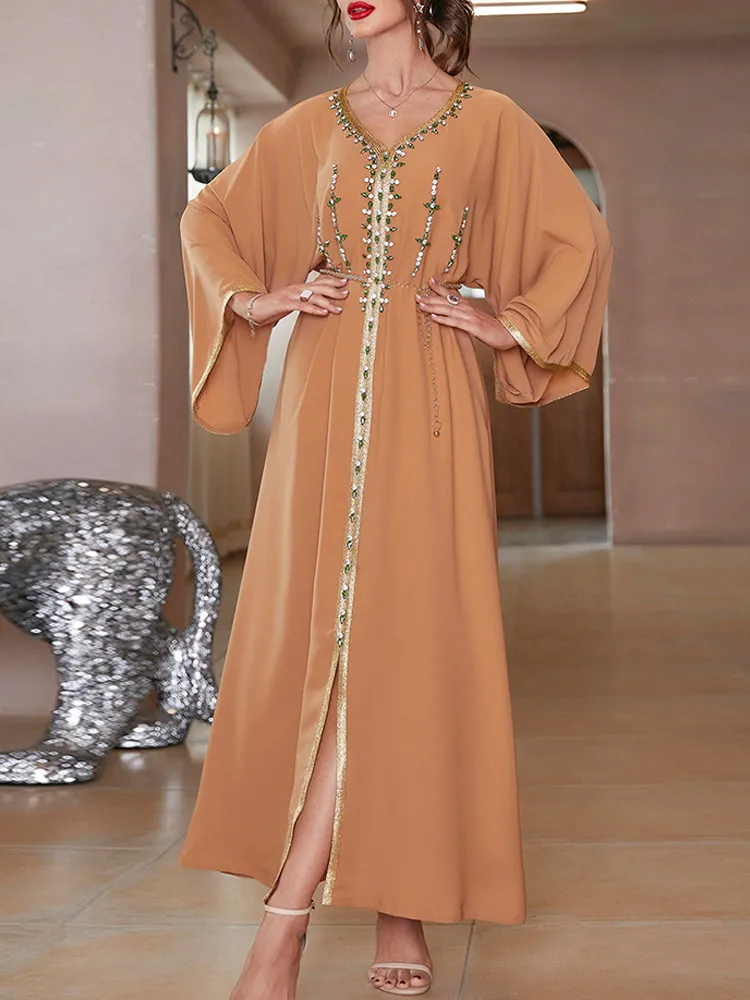 Hand sewn diamond flared sleeve dress gown