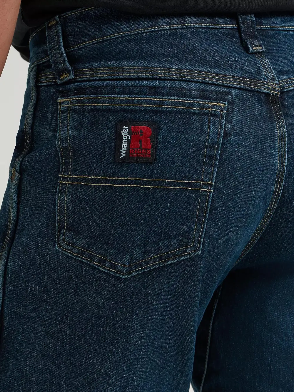 WRANGLER RIGGS WORKWEAR ADVANCED COMFORT FIVE POCKET JEAN IN DARK TINT