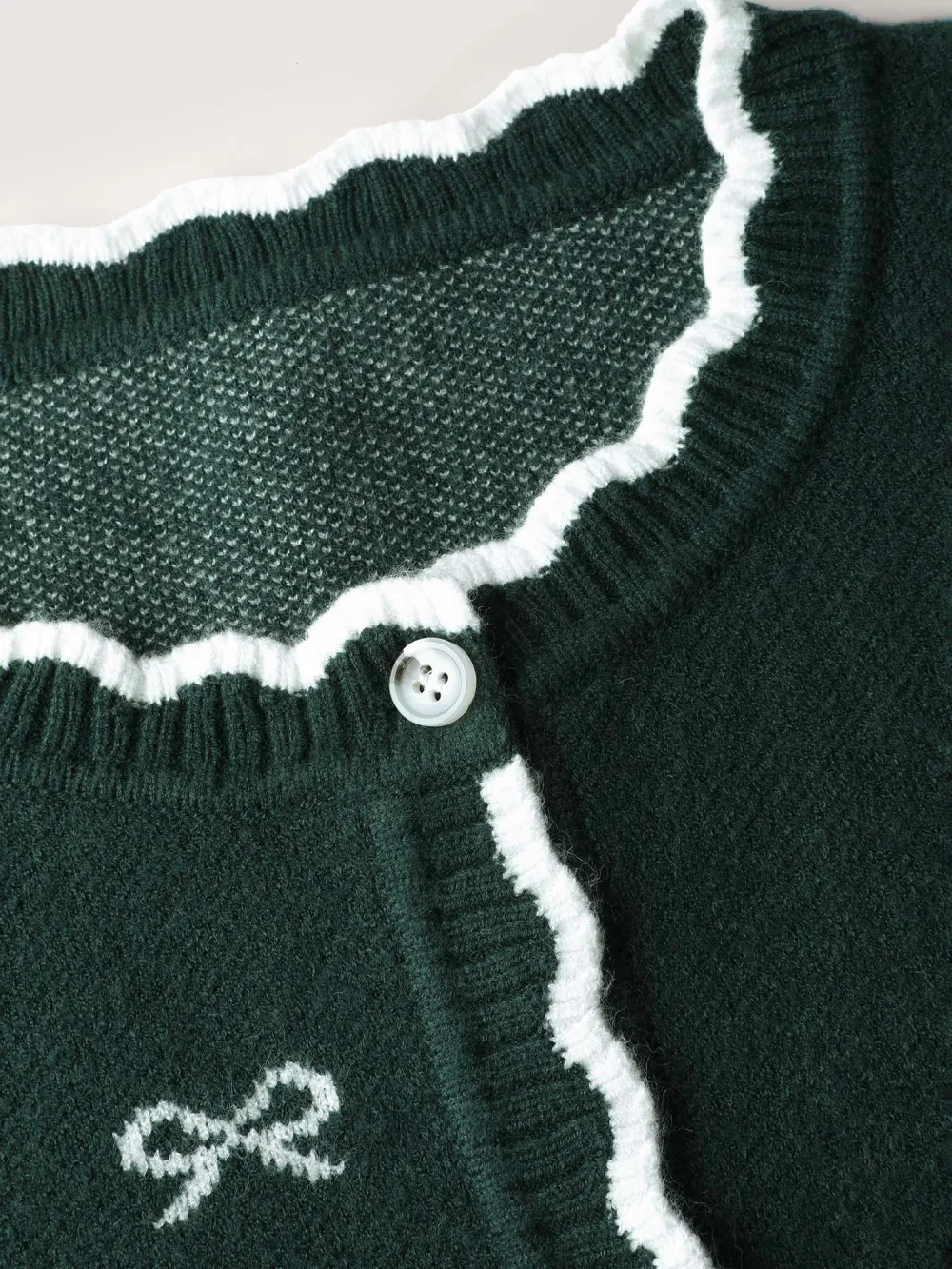 Bowknot Jacquard Wavy Edge Knit Cardigan