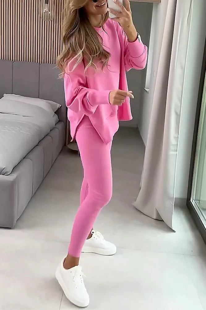 Women's solid color side slit round neck top and slim fit pants two-piece set