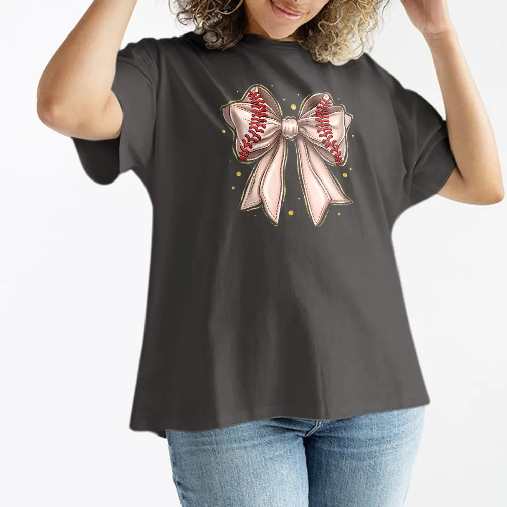 A Casual T-Shirt With A Light Pink Bow And Red Baseball Stitching On The Two Straps.