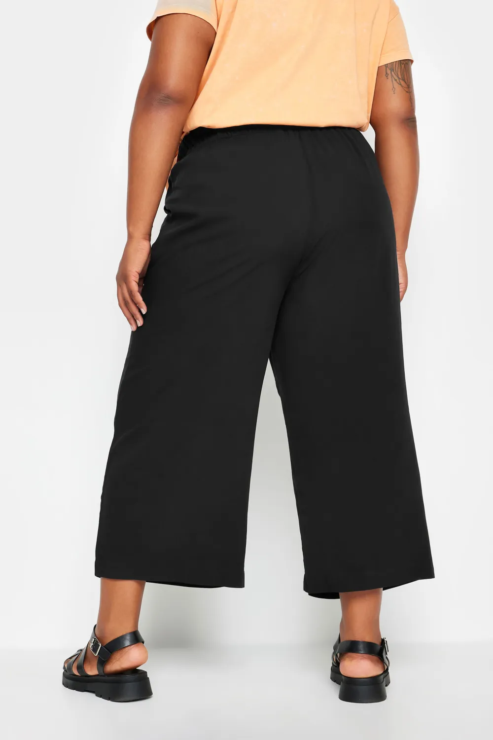 YOURS Curve Green Leaf Print Cropped Trousers