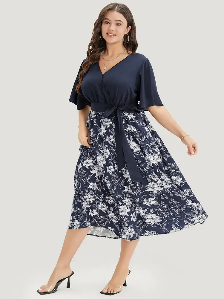 Floral Patchwork Pocket Belt Surplice Neck Ruffle Hem Dress