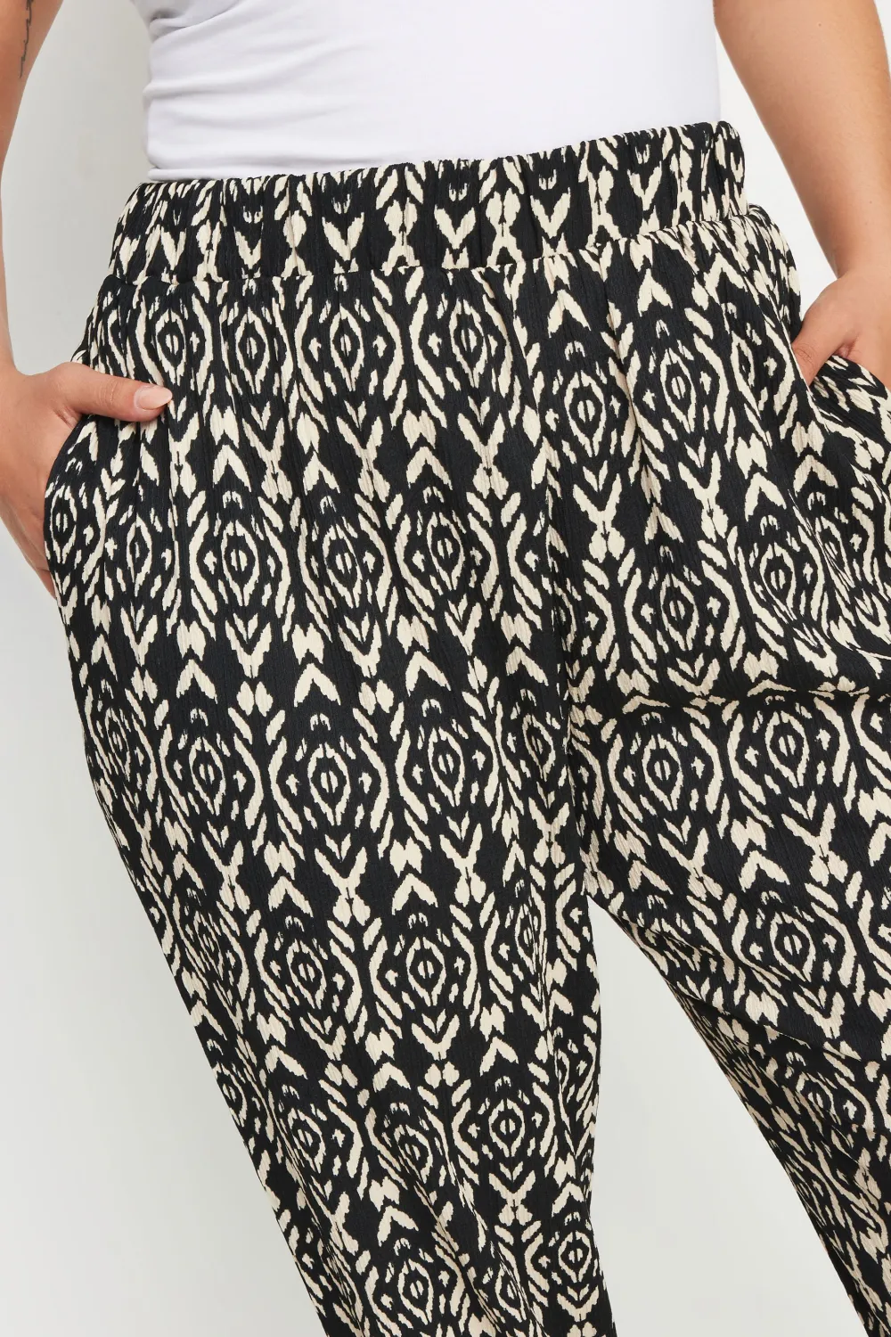 YOURS Curve Black Geometric Print Textured Cropped Harem Trousers