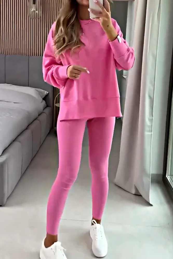Women's solid color side slit round neck top and slim fit pants two-piece set