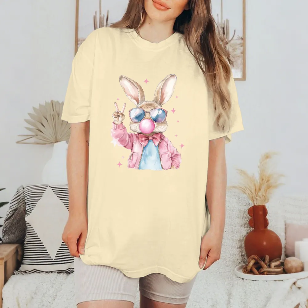 A Cartoon Rabbit Pattern, Wearing Sunglasses, A Pink Jacket And Blue Inner Wear, A Pink Bow Tie, Blowing Bubble Gum In His Mouth, And Making A 