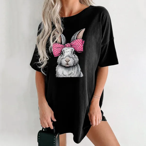 A Cartoon Rabbit With Ears Erected, Wearing A Pink Bow With White Polka Dots, Casual T-Shirt