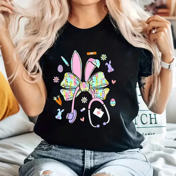 A Bow Pattern With Rabbit Ears, Patterns Of Various Colors On The Bow And Ears, Pencils, Rabbits, Small Flowers, Eggs, Stethoscopes, Heart Shapes, Full Of Childlike Fun, Casual T-Shirt