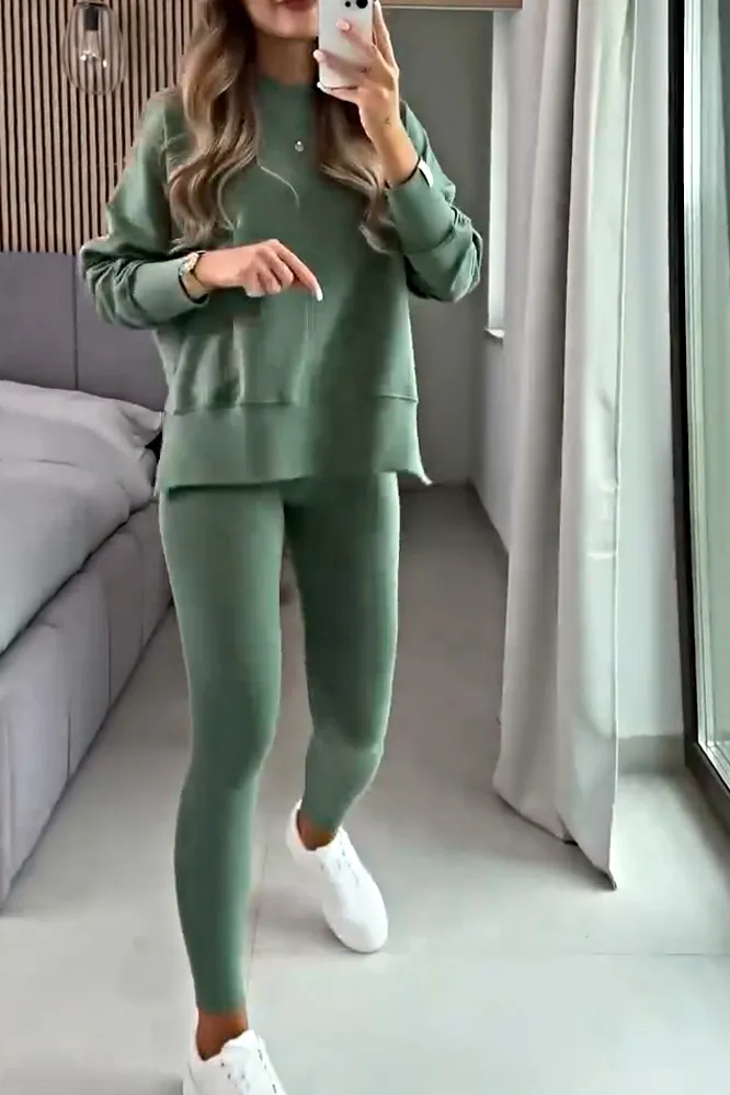 Women's solid color side slit round neck top and slim fit pants two-piece set