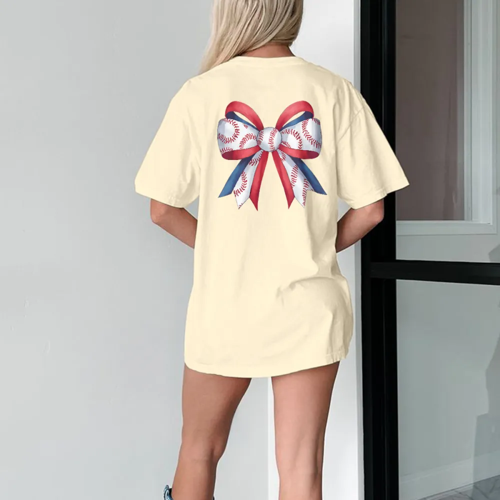 A Red, White And Blue Bow With A Baseball Stitch Pattern Printed On The White Part, A Casual T-Shirt.