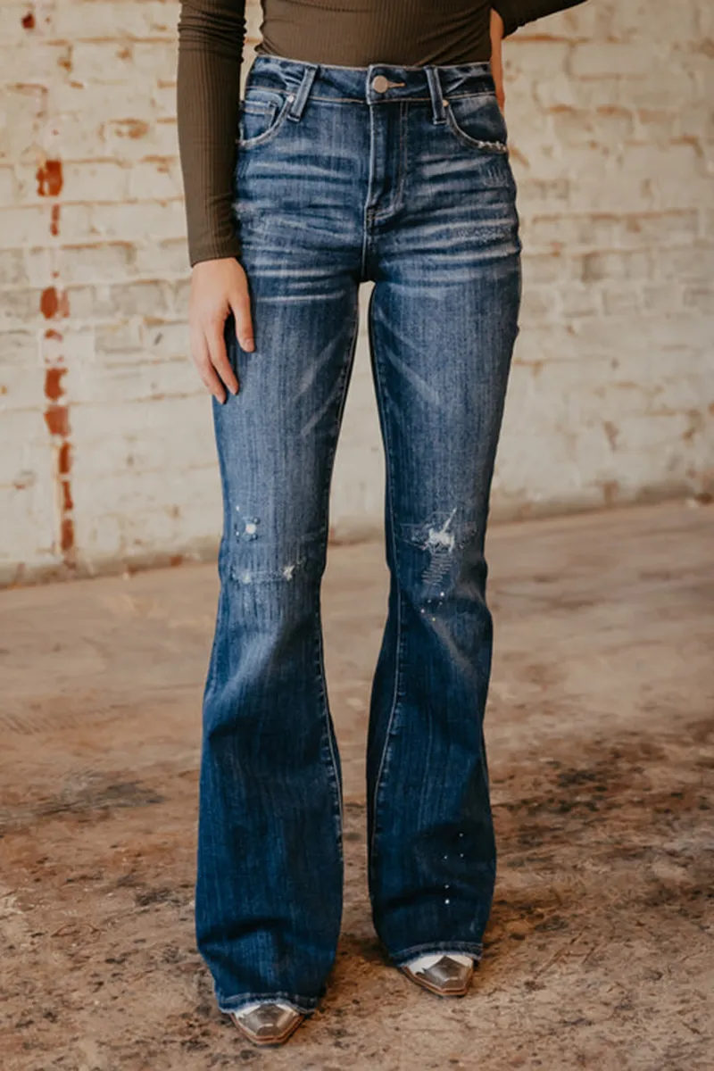 Ripped Slant Pocket Flare Jeans