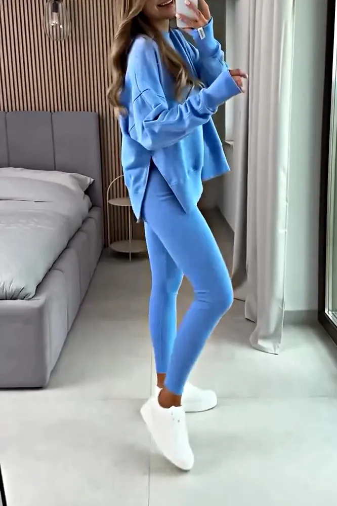 Women's solid color side slit round neck top and slim fit pants two-piece set