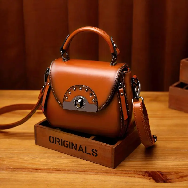 Leather Vintage Leather one shoulder portable diagonal span bag rivet saddle bag