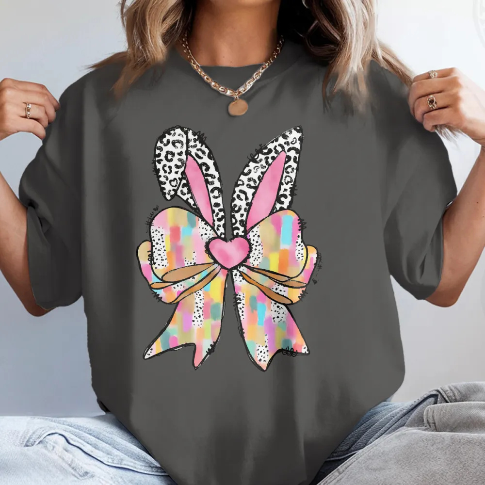 A Colorful Plaid Bow In The Shape Of Rabbit Ears, With Leopard Print Decorations And A Pink Heart Pattern On The Ears, And A Casual T-Shirt.