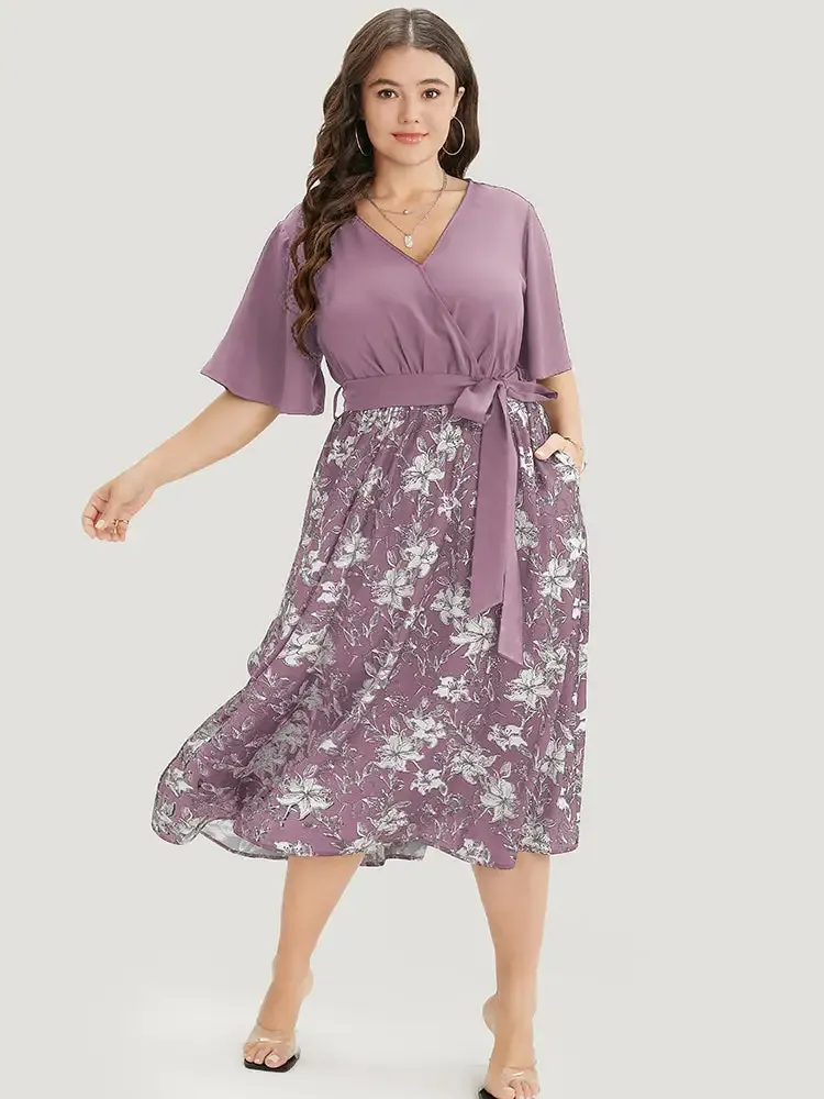 Floral Patchwork Pocket Belt Surplice Neck Ruffle Hem Dress