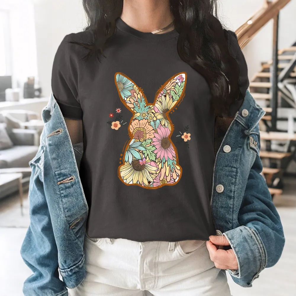 An Illustration Based On The Outline Of A Rabbit, With Floral Patterns Of Various Colors Filled In And Some Small Flowers And Leaves Dotted Around It, A Casual T-Shirt.
