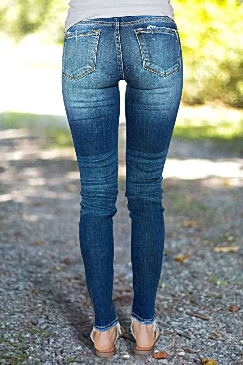 Distressed Low Rise Skinny Jeans