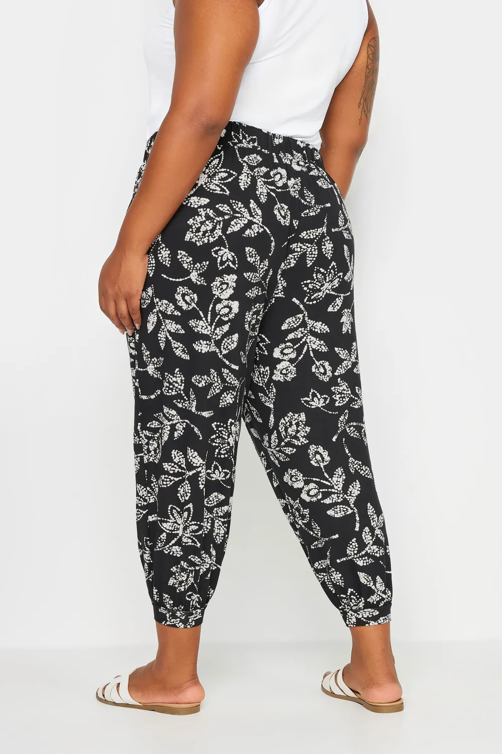 YOURS Curve Beige Brown Leaf Print Cropped Harem Trousers