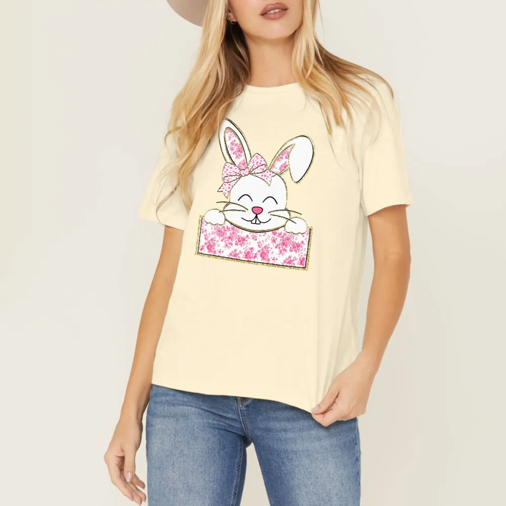 A Cute Cartoon Rabbit Pattern, The Rabbit Is Wearing A Pink Floral Bow, With Its Two Front Paws Resting On A Pink Floral Sign, Casual T-Shirt