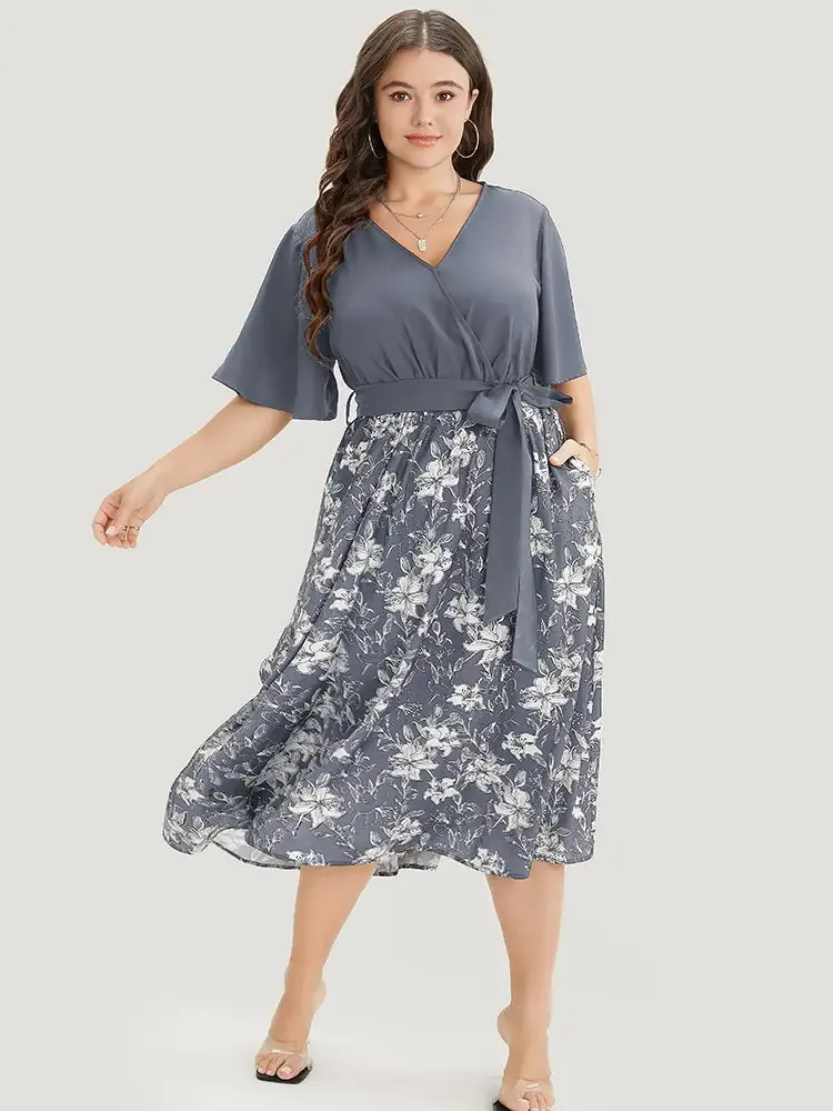 Floral Patchwork Pocket Belt Surplice Neck Ruffle Hem Dress